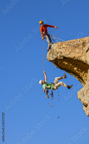 Photo: Falling climber saved by his partner. Falling climber saved by his partner.