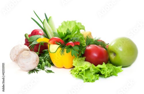 Photo: Fresh vegetables with green leaves of parsley,salad,cucumbers Fresh vegetables with green leaves of parsley,salad,cucumbers