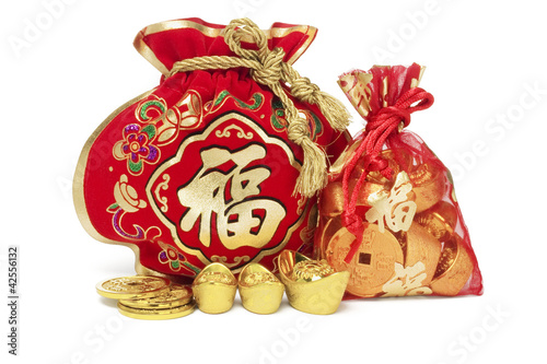 Photo: Red Gift Bags and Gold Ingots Red Gift Bags and Gold Ingots