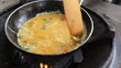 As a step in how to make an omelet.