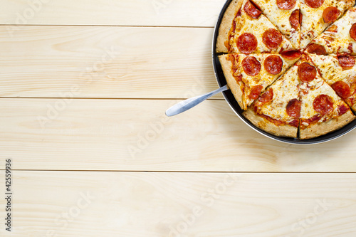 Photo: pizza on the pan pizza on the pan