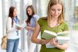 Photo: High school teenage student female read book High school teenage student female read book