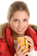 Photo: Young woman with hot beverage Young woman with hot beverage
