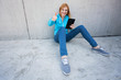 Woman with digital tablet and thumbs up