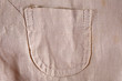 abric colored in beige tones, textural background