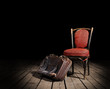 Red chair and suitcase