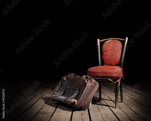 Photo: Red chair and suitcase Red chair and suitcase