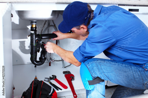 Photo: Professional plumber. Professional plumber.