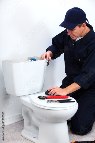 Photo: Professional plumber. Professional plumber.