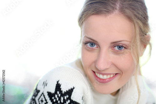 Photo: Portrait of beautiful blond girl on white background Portrait of beautiful blond girl on white background