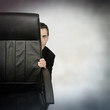 Photo: hiding businessman hiding businessman