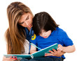 Boy coloring with his mother