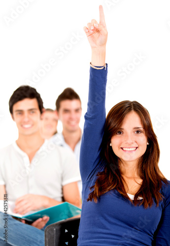 Photo: Student in class raising hand Student in class raising hand