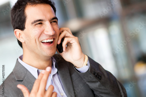 Photo: Business man on the phone Business man on the phone