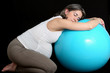 Pregnant woman and gym ball