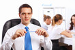 Foto: Young businessmen working in the office Young businessmen working in the office