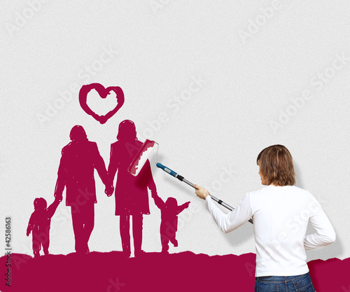 Foto: Family and home symbol on the wall Family and home symbol on the wall