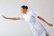 Photo: Young female doctor in white uniform Young female doctor in white uniform