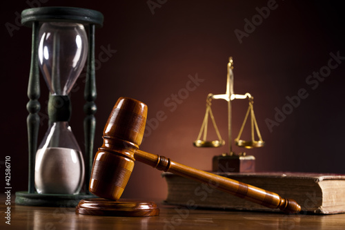Photo: Law theme, mallet of judge, wooden gavel Law theme, mallet of judge, wooden gavel