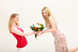 Vivacious woman receiving floral gift