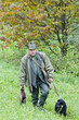 hunter with a dog at hunt