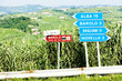 signposts near Barolo, Piedmont, Italy