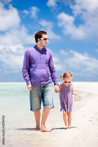 Photo: Father and daughter at beach Father and daughter at beach