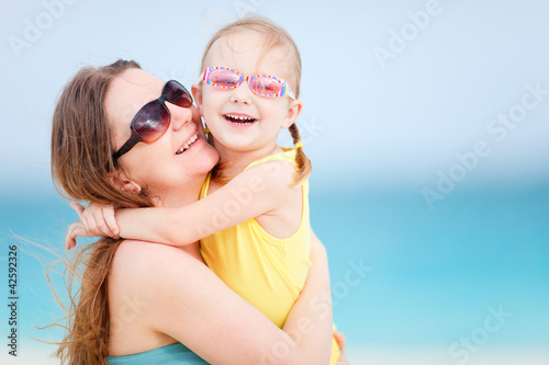 Photo: Family on summer beach vacation Family on summer beach vacation