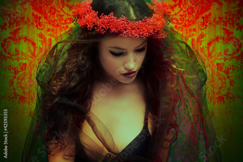 Photo: fantasy woman with wreath of flowers fantasy woman with wreath of flowers