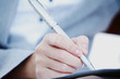 Foto: woman write by pen woman write by pen