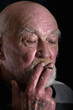 Photo: Old man smoking Old man smoking