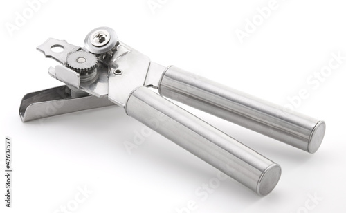 Photo: Stainless steel can opener isolated on white background Stainless steel can opener isolated on white background