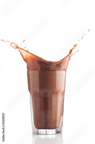 Photo: Chocolate splashing into glass Chocolate splashing into glass