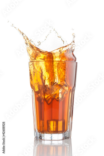 Photo: splash of iced tea isolated splash of iced tea isolated