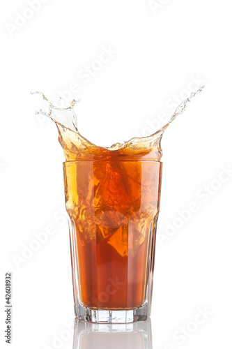 Photo: splash of iced tea isolated splash of iced tea isolated