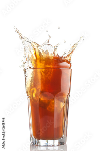Photo: splash of iced tea isolated splash of iced tea isolated
