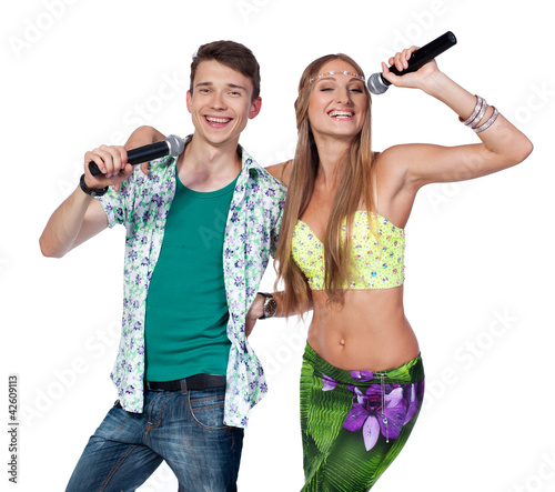 Photo: Happy young guy and girl are singing Happy young guy and girl are singing