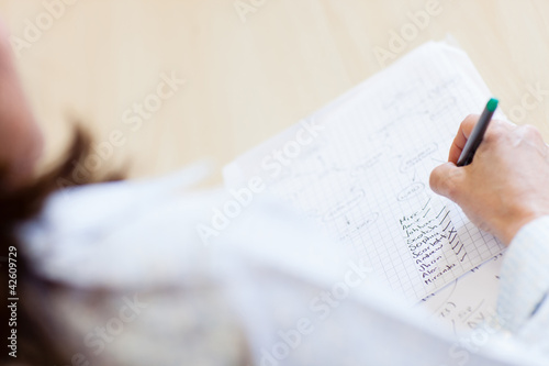 Foto: Teacher with attendance list Teacher with attendance list