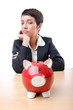 Woman and piggybank on white