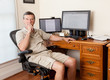 Senior male working in home office