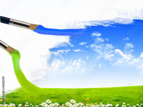 Photo: Paint brushes and landscape image Paint brushes and landscape image