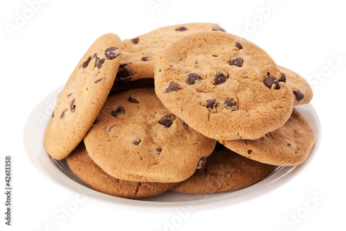 Photo: Plate of chocolate chip cookies isolated on white Plate of chocolate chip cookies isolated on white
