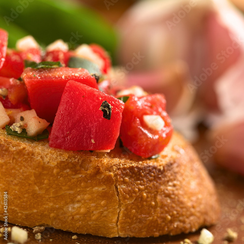 Photo: Crispy Italian antipasto, Bruschetta with tomato and garlic Crispy Italian antipasto, Bruschetta with tomato and garlic