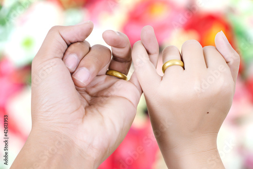 Photo: Two hand touch for love concept. Two hand touch for love concept.