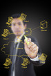 Businessman write LAN diagram on the whiteboard.