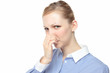 Photo: Women pinch the nose Women pinch the nose