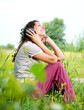 Beautiful Young Woman with Headphones Outdoors. Enjoy Music