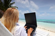 Photo: tropical business woman with laptop tropical business woman with laptop