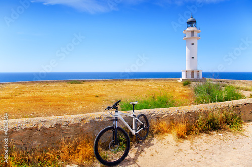 Photo: bicycle on Balearic Formentera Barbaria Lighthouse bicycle on Balearic Formentera Barbaria Lighthouse