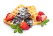 belgium waffles with strawberries and mint  isolated on white